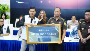 Bareskrim Polri mengeksekusi aset judi online senilai Rp58 miliar dari 133 rekening dan menyerahkannya kepada negara melalui Kejaksaan Agung. (Foto: RN/HO-HUMAS POLRI)