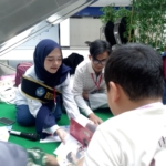 Program Mudik Asyik Baca Buku 2026 bagikan ribuan buku gratis di Pelabuhan Merak untuk tingkatkan minat baca anak selama perjalanan mudik. (Foto: RN/Tama)