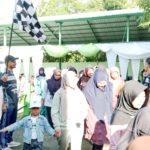 Ribuan alumni dan warga memadati HUT ke-33 SMK Ma’arif NU Paguyangan, Brebes. Jalan sehat, reuni akbar, hingga doorprize meriahkan acara. (Foto: ReportaseNews/Kus)