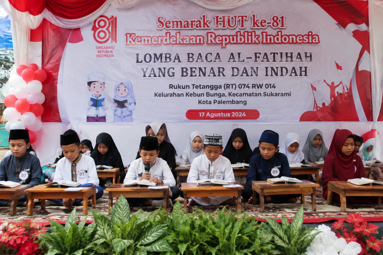 Warga Kebun Bunga Palembang menggelar Lomba Baca Al-Fatihah untuk memeriahkan HUT ke-81 RI sekaligus mengajak masyarakat memperbaiki bacaan sesuai tajwid. (Foto: ReportaseNews/Don)